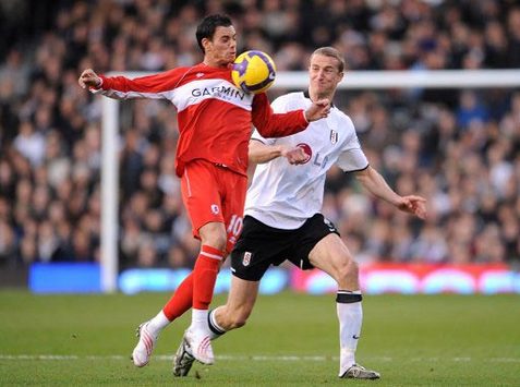 Brede Hangeland tangles with Jeremie Aliadiere as Fulham entertain Middlesbrough