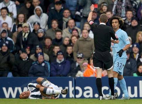Tottenham Hotspur's Benoit Assou-Ekotto shown his second red card of the season for a rash challenge against West Bromwich Albion.