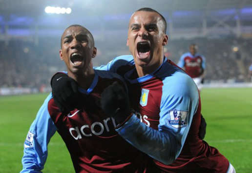 Aston Villa's dynamic duo, Ashley Young and Gabriel Agbonlahor, celebrate the team's 1-0 win over Hull City (PA)