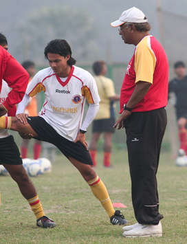 Sanju Pradhan with Coach Subhash Bhowmick (Mango Peel)