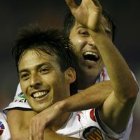 Double David: Silva and Villa did the damage as Valencia downed Atletico Madrid 3-1.
