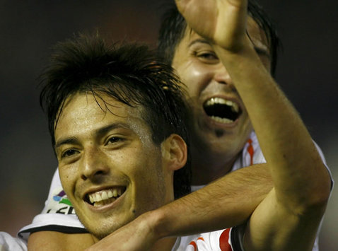 Double David: Silva and Villa did the damage as Valencia downed Atletico Madrid 3-1.