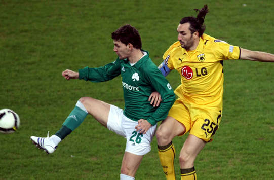Action from the Athens derby: Panathinaikos against AEK.