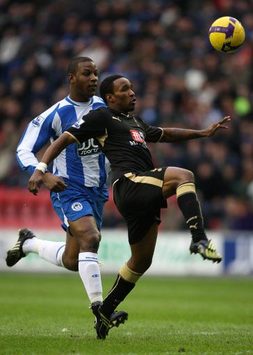 EPL: Titus Bramble - Jermain Defoe, Wigan Athletic v Tottenham Hotspur (PA)