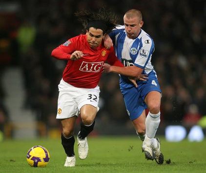 İngiltere: Lee Cattermole (Wigan Athletic) - Carlos Tevez (Manchester United) (PA)