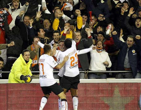 Joaquin, Mata and Miguel celebrate during Valencia's comeback Copa del Rey win over Sevilla.
