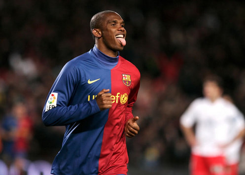 Samuel Eto'o celebrates yet another goal as Barcelona run out 4-1 winners against Numancia.