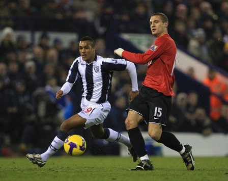 EPL: Nemanja Vidic battles - Albion's Jay Simpson, West Bromwich Albion v Manchester United (PA)