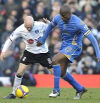EPL: Andrew Johnson - Sylvain Distin, Fulham v Portsmouth (PA)