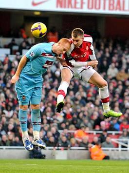 EPL: Nicklas Bendtner - James Collins, Arsenal - West Ham United (PA)