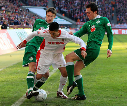Bundesliga: 1. FC Köln - VfL Wolfsburg, Marcel Schäfer - Christian Gentner - Taner Yalcin (firo)