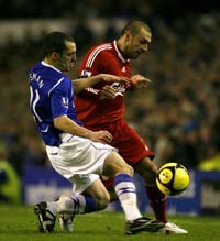 FA Cup: Leon Osman - Andrea Dossena, Everton v Liverpool (PA)