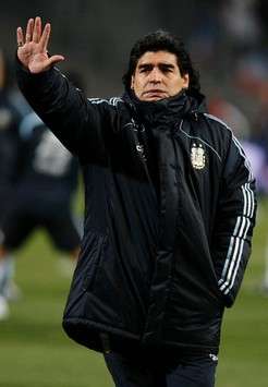 Diego Armando Maradona, coach of Argentina, salutes the fans before the friendly against France