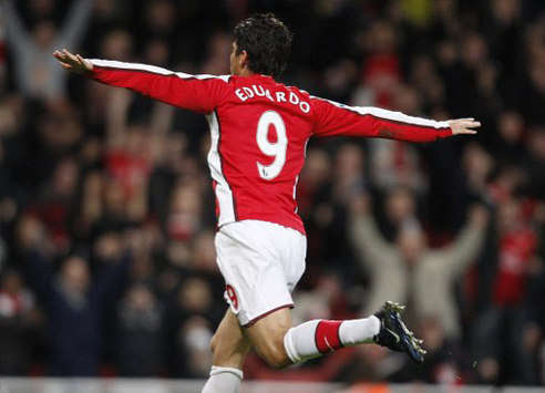 Eduardo's back. Arsenal's Croatian hitman makes a stylish return from a horror injury as he helps the Gunners crush FA Cup rival Cardiff City 4-0 (PA)