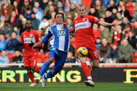 EPL: David Wheater - Amr Zaki, Middlesbrough - Wigan Athletic (PA)