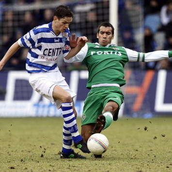 Rogier Meijer vs Giovanni van Bronckhorst, De Graafschap - Feyenoord (Foto ANP)
