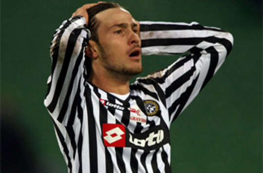 Antonio Floro Flores rues a missed chance for Udinese against Polish side Lech Poznan in the Uefa Cup