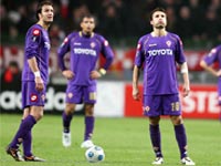 Alberto Gilardino and Adrian Mutu despair after Fiorentina are eliminated from the UEFA Cup by Ajax