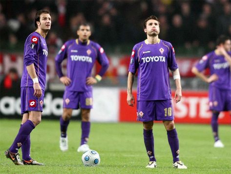 Alberto Gilardino and Adrian Mutu despair after Fiorentina are eliminated from the UEFA Cup by Ajax
