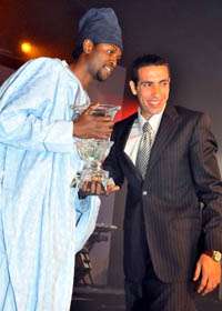 Emmanuel Adebayor and Mohammed Aboutrika