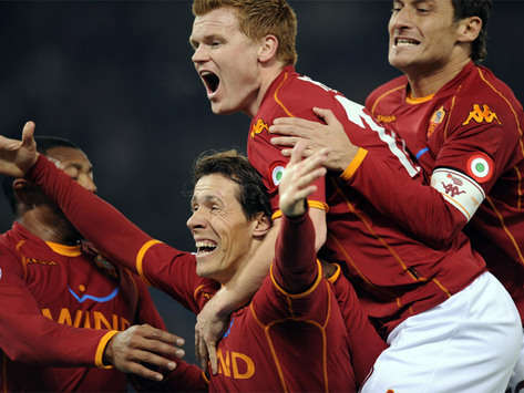 Roma's Rodrigo Taddei celebrates scoring for Roma against Siena