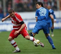 Bundesliga: VfL Bochum - Bayern München, Lukas Podolski, Patrick Fabian (firo)