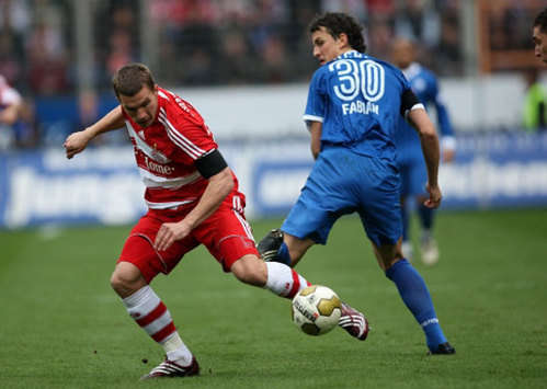 Bundesliga: VfL Bochum - Bayern München, Lukas Podolski, Patrick Fabian (firo)