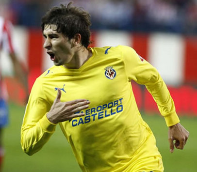 Villarreal's Cani celebrates his goal against Atletico Madrid