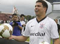 Ronaldo enjoys a joke for Corinthians as the football continues to bring a smile to his face