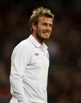 England ace David Beckham is all smiles after supplying the cross for Wayne Rooney's goal against Slovakia at Wembley
