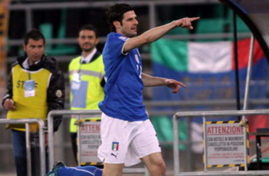 Italy striker Vincenzo Iaquinta is delighted as he celebrates his goal against Ireland in Bari