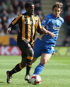 EPL: Bernard Mendy - Niko Kranjcar, Hull City v Portsmouth (PA)