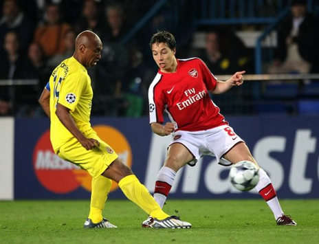 Marcos Senna clashes with Samir Nasri during the 1-1 draw between Villarreal and Arsenal in the Champions League