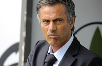 Inter coach Jose Mourinho knows how to smile for the camera