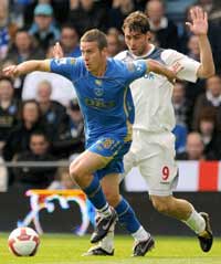 EPL: Sean Davis - Johan Elmander, Portsmouth - Bolton Wanderers (PA)