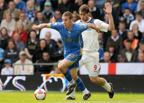 EPL: Sean Davis - Johan Elmander, Portsmouth - Bolton Wanderers (PA)