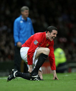 John O'Shea in action for Manchester United against Portsmouth