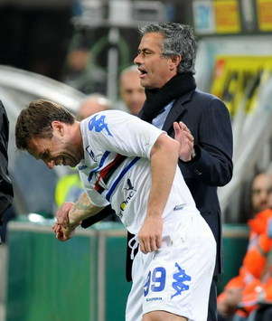 Antonio Cassano and Josè Mourinho share a joke during the Coppa Italia semi-final match between Inter and Sampdoria