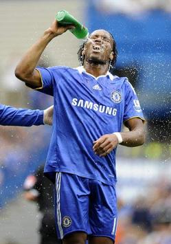 Dider Drogba is in triumphant mood for Chelsea against Fulham (PA)