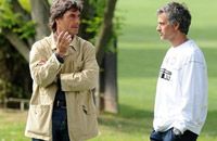 Former Lecce coach Mario Beretta takes advice from Inter's José Mourinho at the Nerazzurri's Appiano Gentile training ground