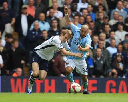 EPL: Nigel De Jong and Tottenham Hotspur's Roman Pavlyuchenko, Tottenham Hotspur v Manchester City (PA)
