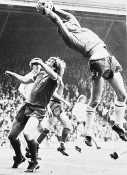 Ray Clemence of Tottenham Hotspur versus Kenny Dalglish of Liverpool (PA)