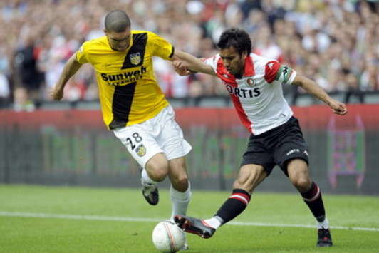 Dutch play-offs: Tyrone Loran vs. Giovanni van Bronckhorst, Feyenoord - NAC Breda (foto PRO SHOTS)