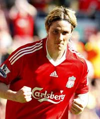 Feranando Torres celebrates Liverpool's 3-1 win over Tottenham Hotspur at Anfield