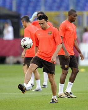 Barcelona's Xavi firmly focussed on the Champions League final as he trains at the Olimpico