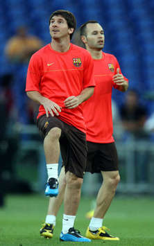 Lionel Messi and Andres Iniesta - Barcelona (PA)