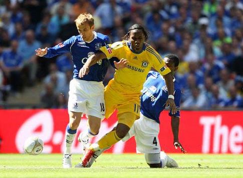 FA Cup: Didier Drogba - Phil Neville, Chelsea - Everton (PA)