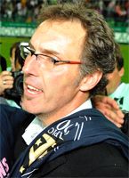 Yohann Gourcuff and Laurent Blanc celebrating as Bordeaux become new France champions