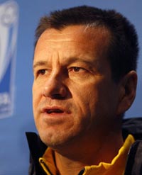 Brazil coach Carlos Dunga takes questions from he press after landing in South Africa for the Confederations Cup