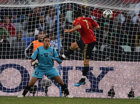 Confederations Cup: David Villa heads in a Capdevilla cross to give Spain the lead against Iraq (PA)